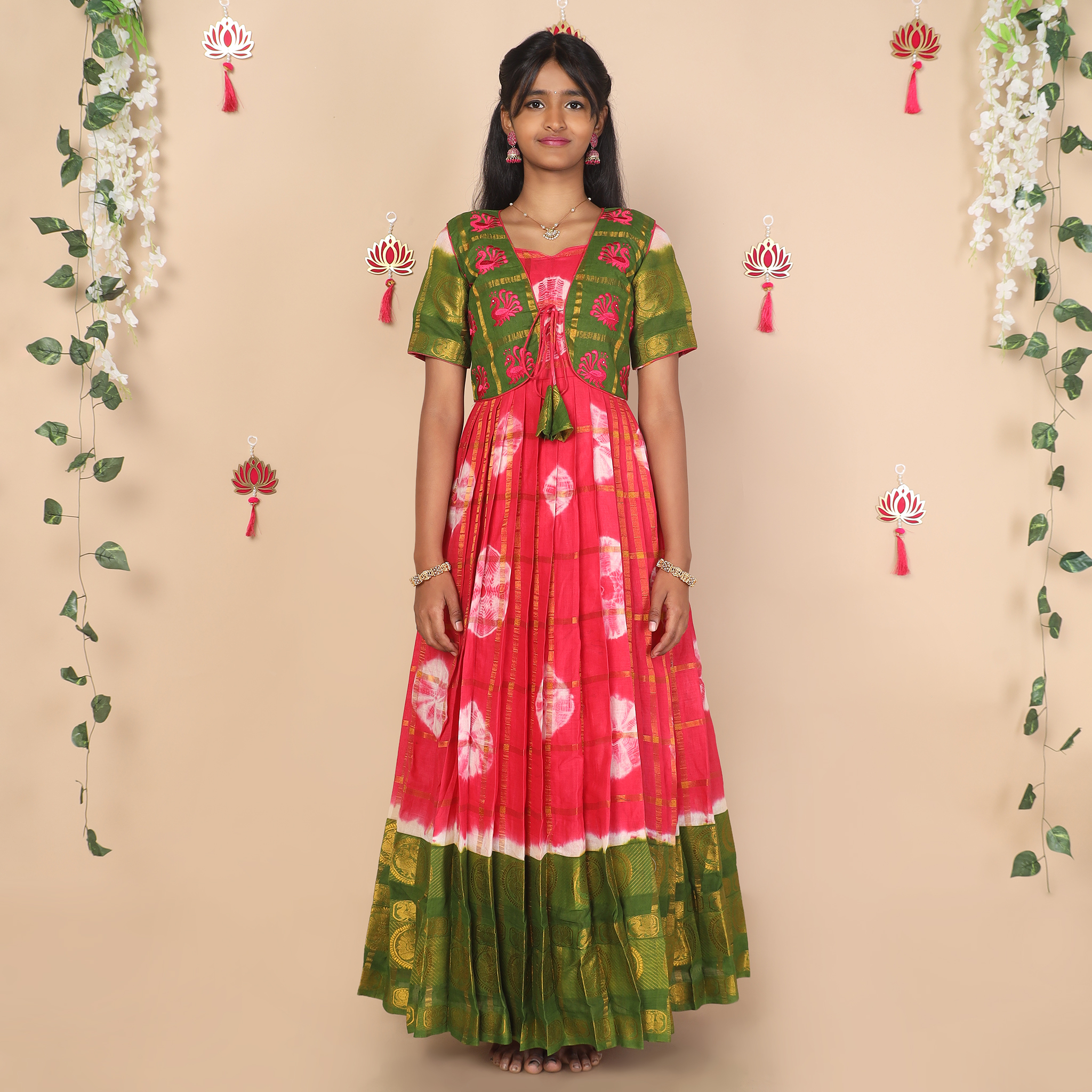 Front view of pink and green ethnic jacket for girls
