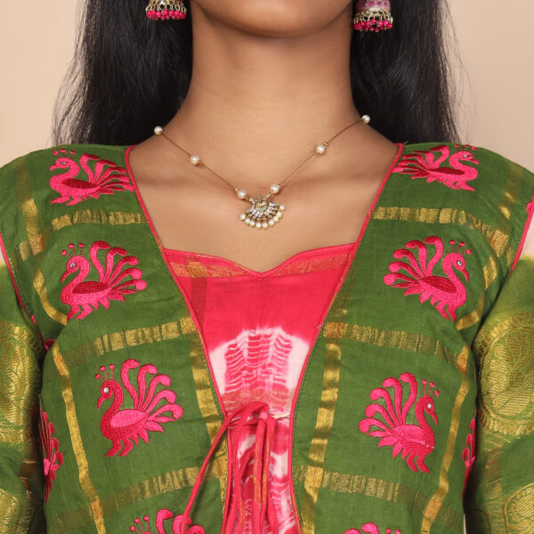 Close up traditional pattern detail on ethnic jacket for girls