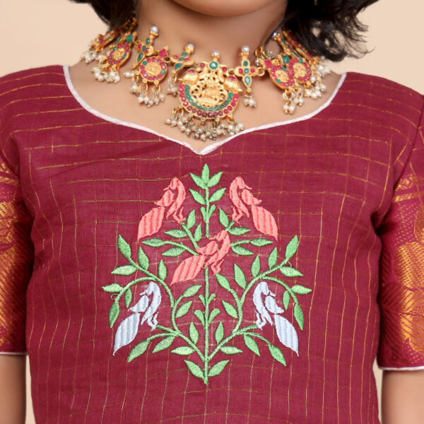 Close up canvas print detail on girls festive dress