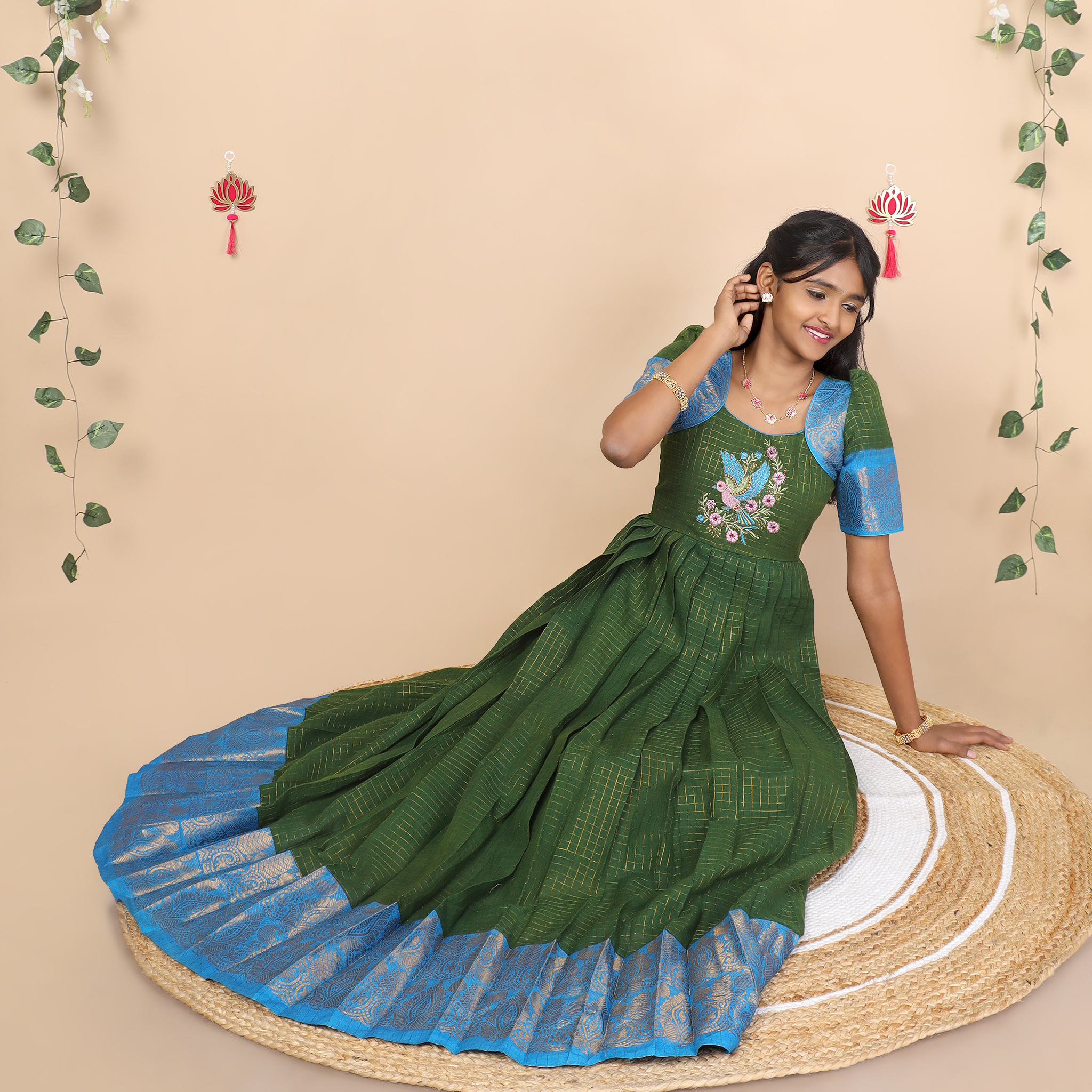 Front of olive green and blue ethnic long gown for girls