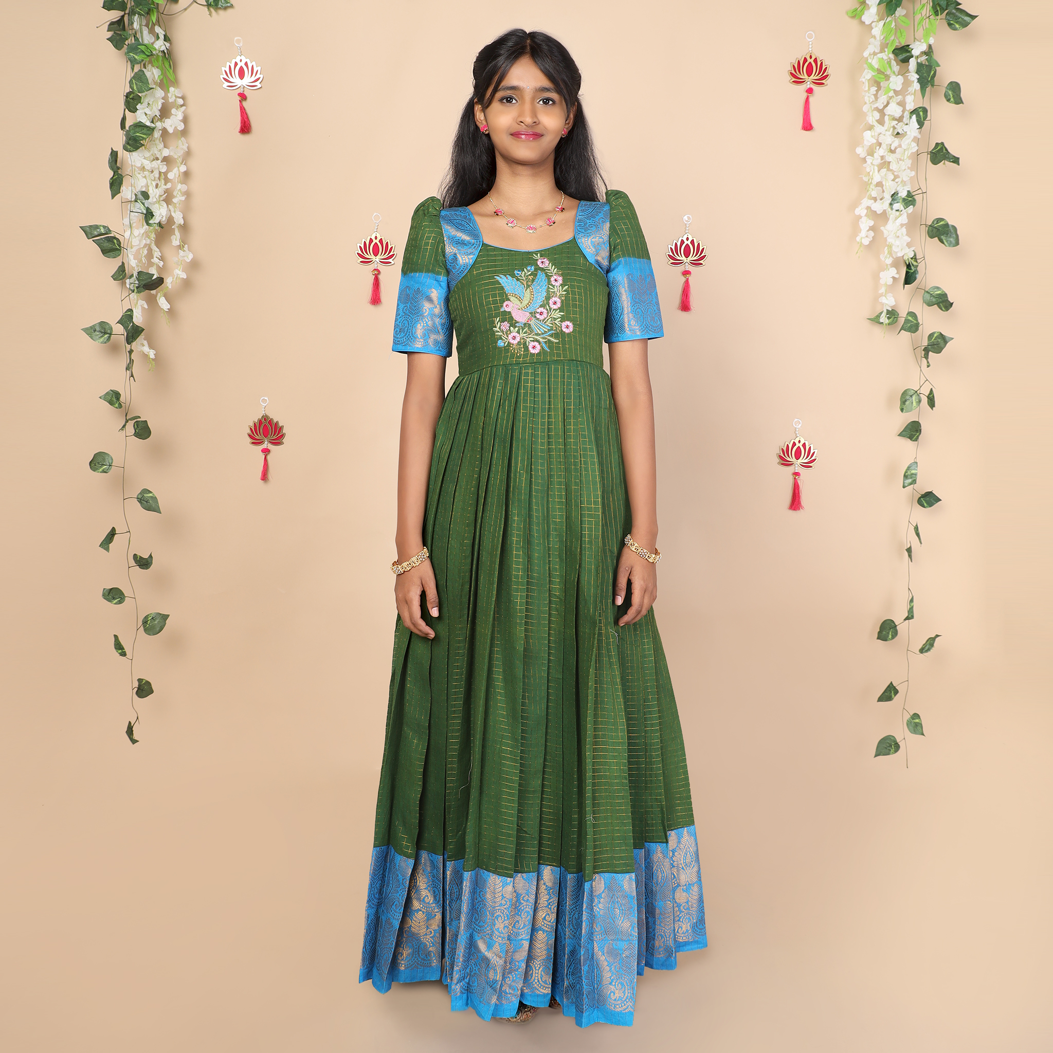 Front view of olive green and blue ethnic long gown for girls