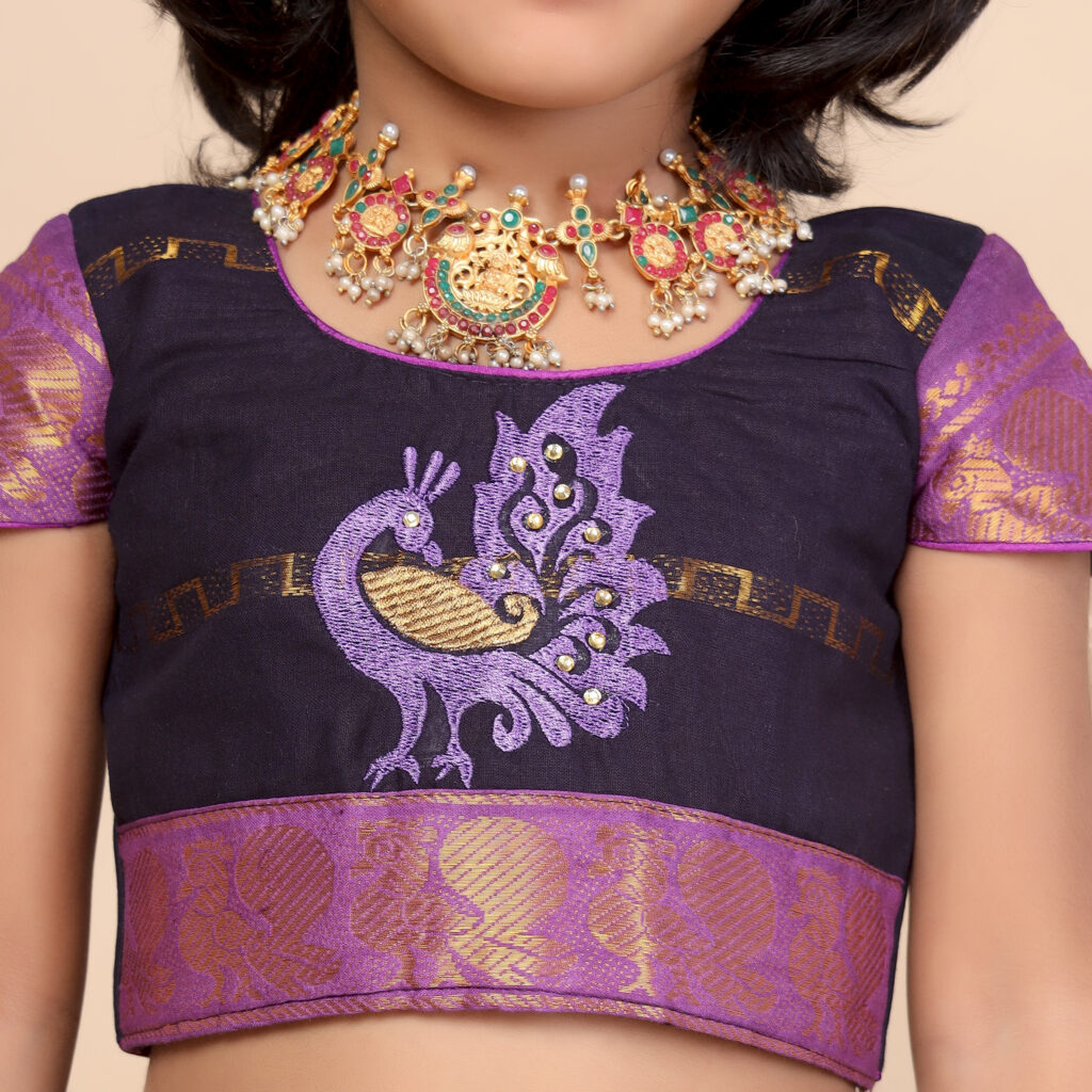 Close up canvas print detail on deep blue skirt and crop top set for girls