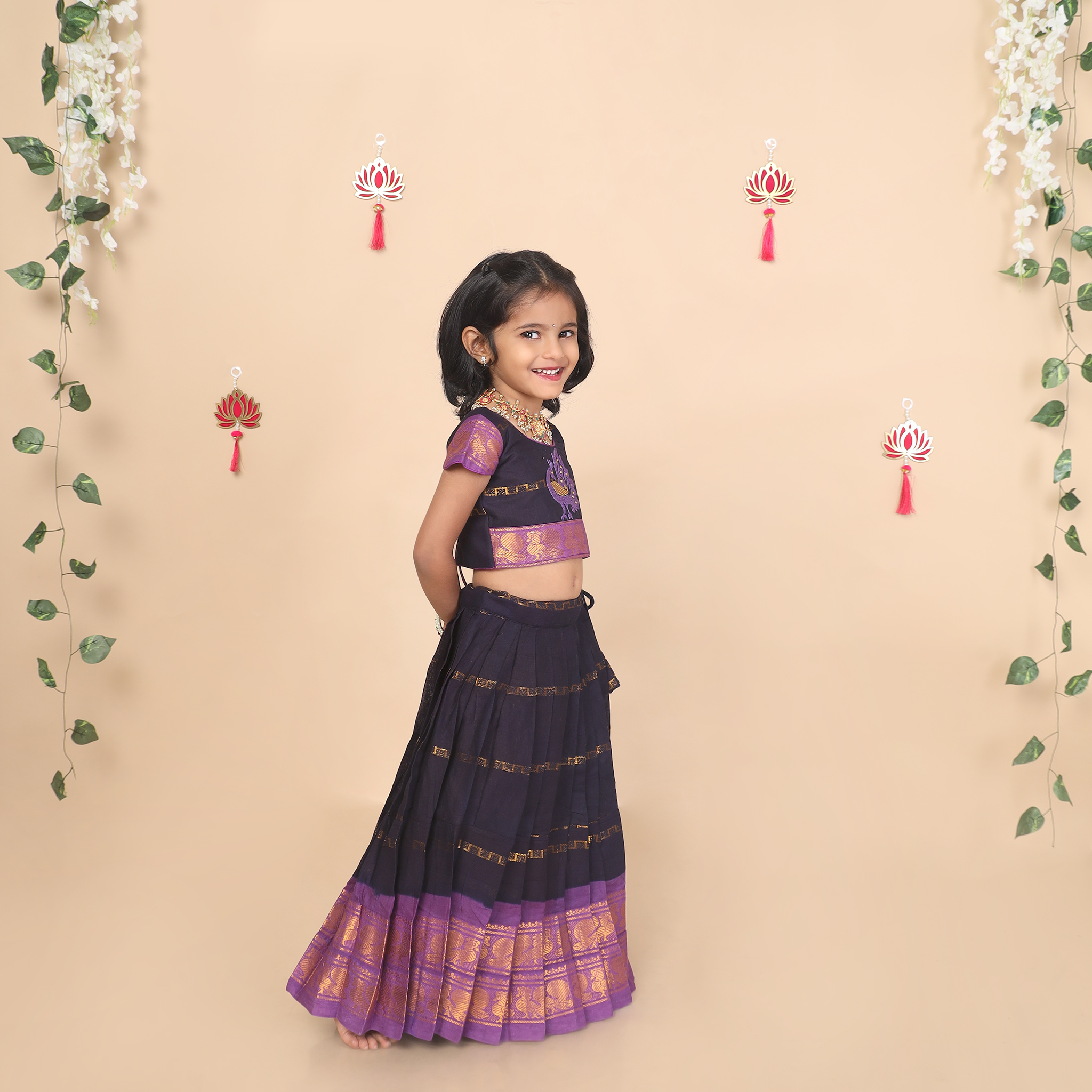 Side view of deep blue skirt and crop top set for girls