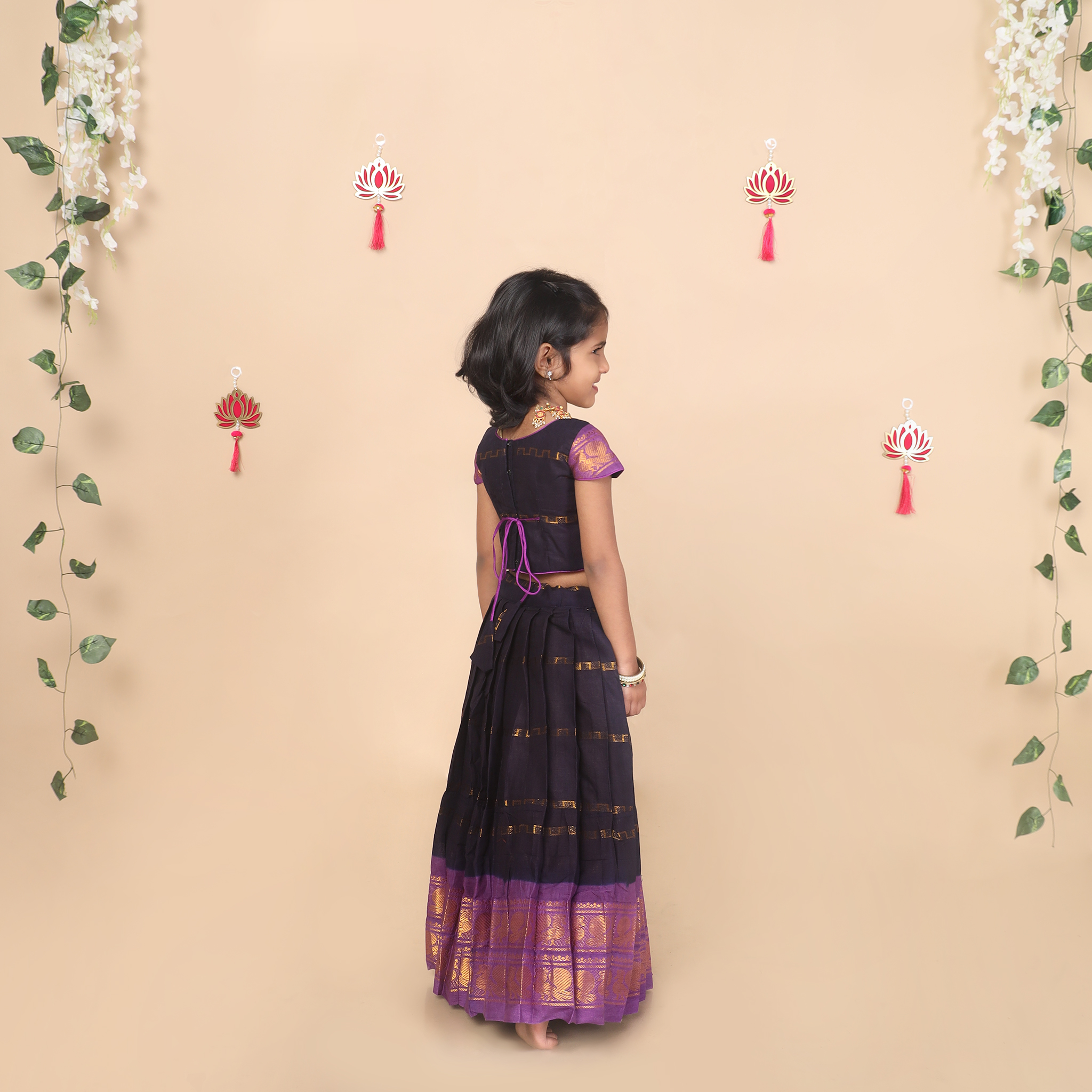 Back view of deep blue skirt and crop top set for girls