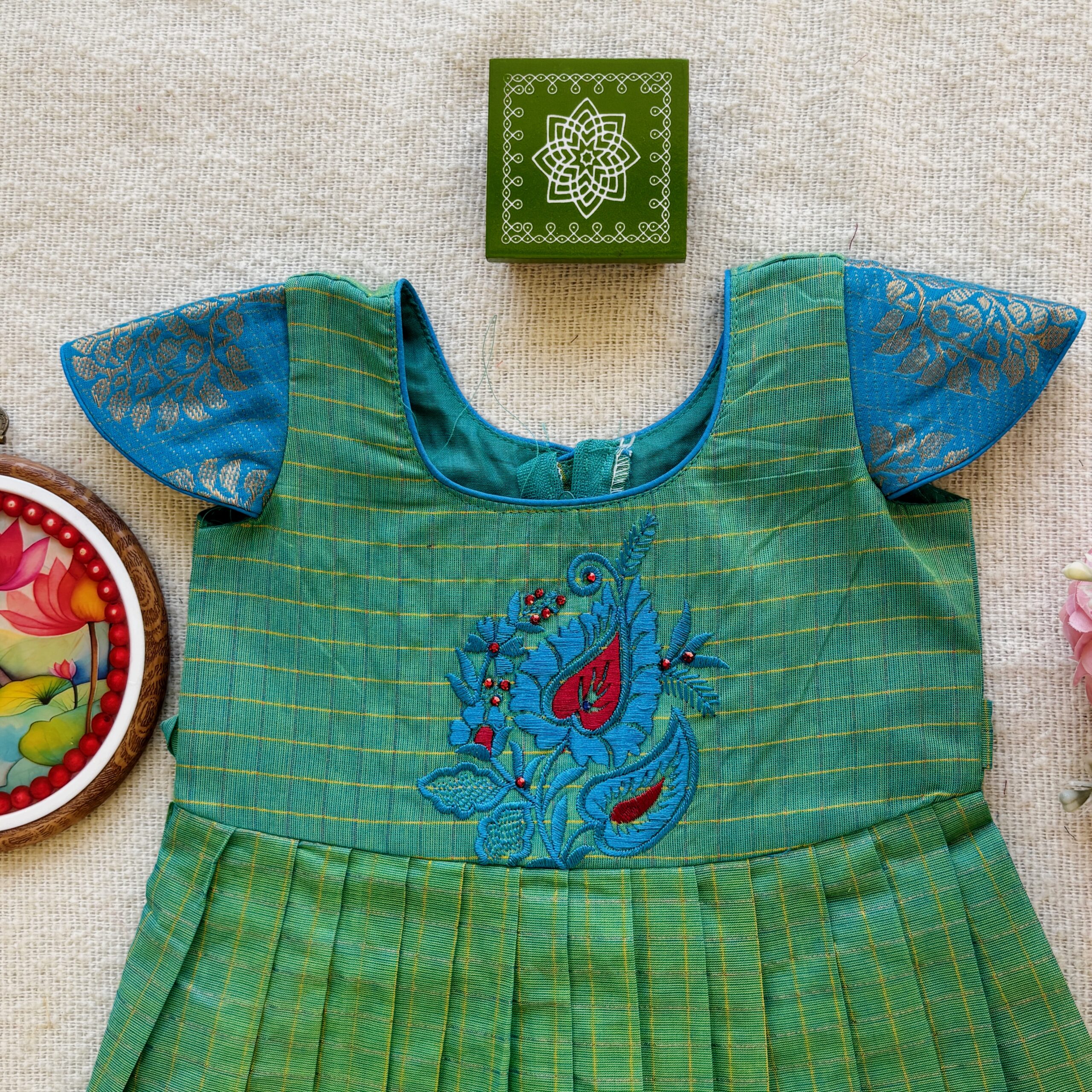Hand embroidered design on kids festive frock