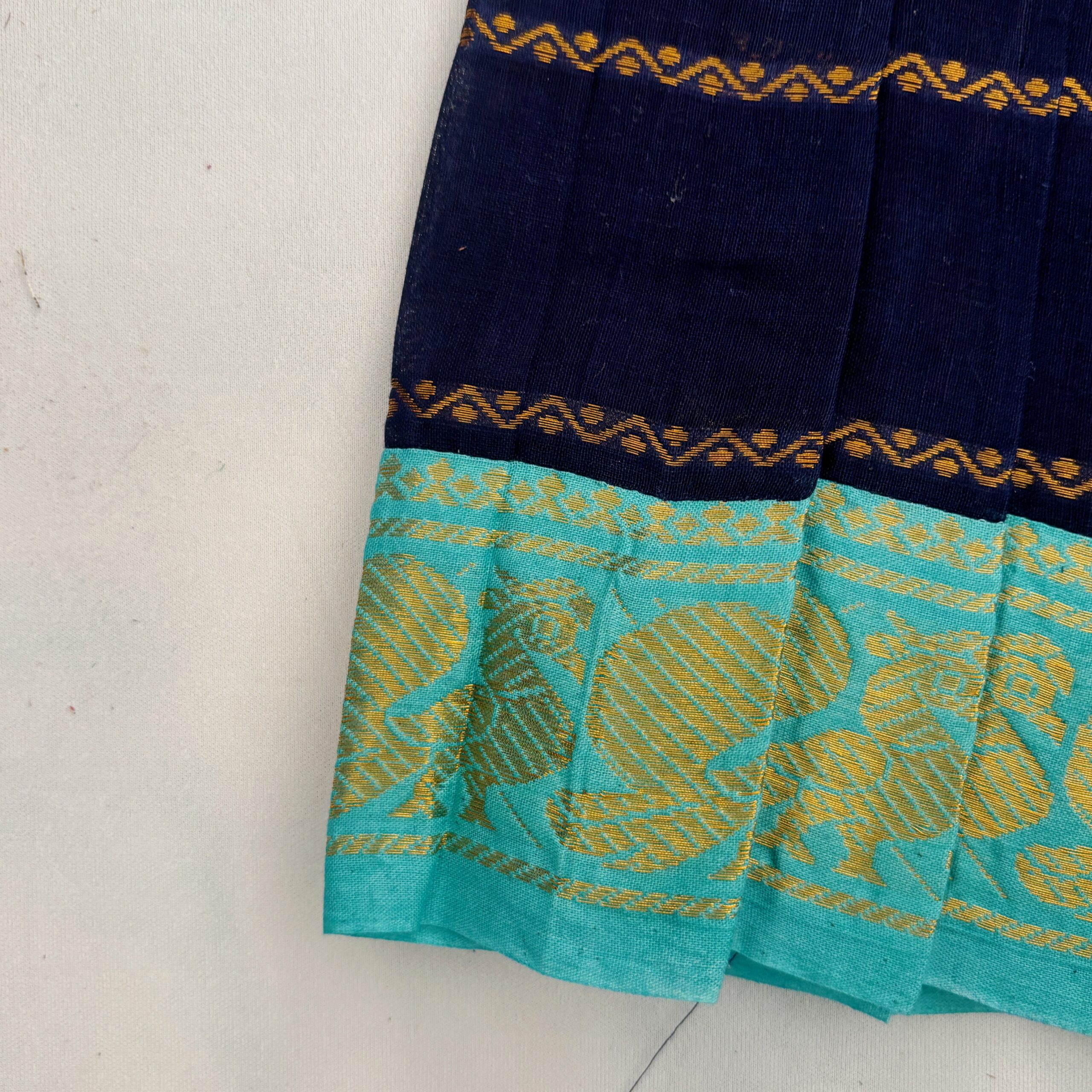Teal and gold border detail on navy blue traditional kids frock