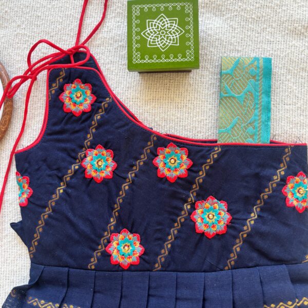 One shoulder strap design detail of navy blue kids festive frock