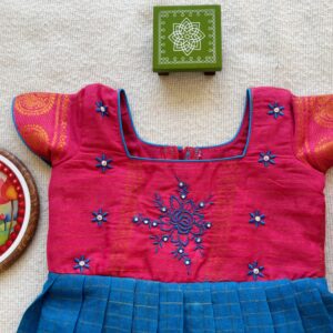 Embroidered pink bodice of kids frock