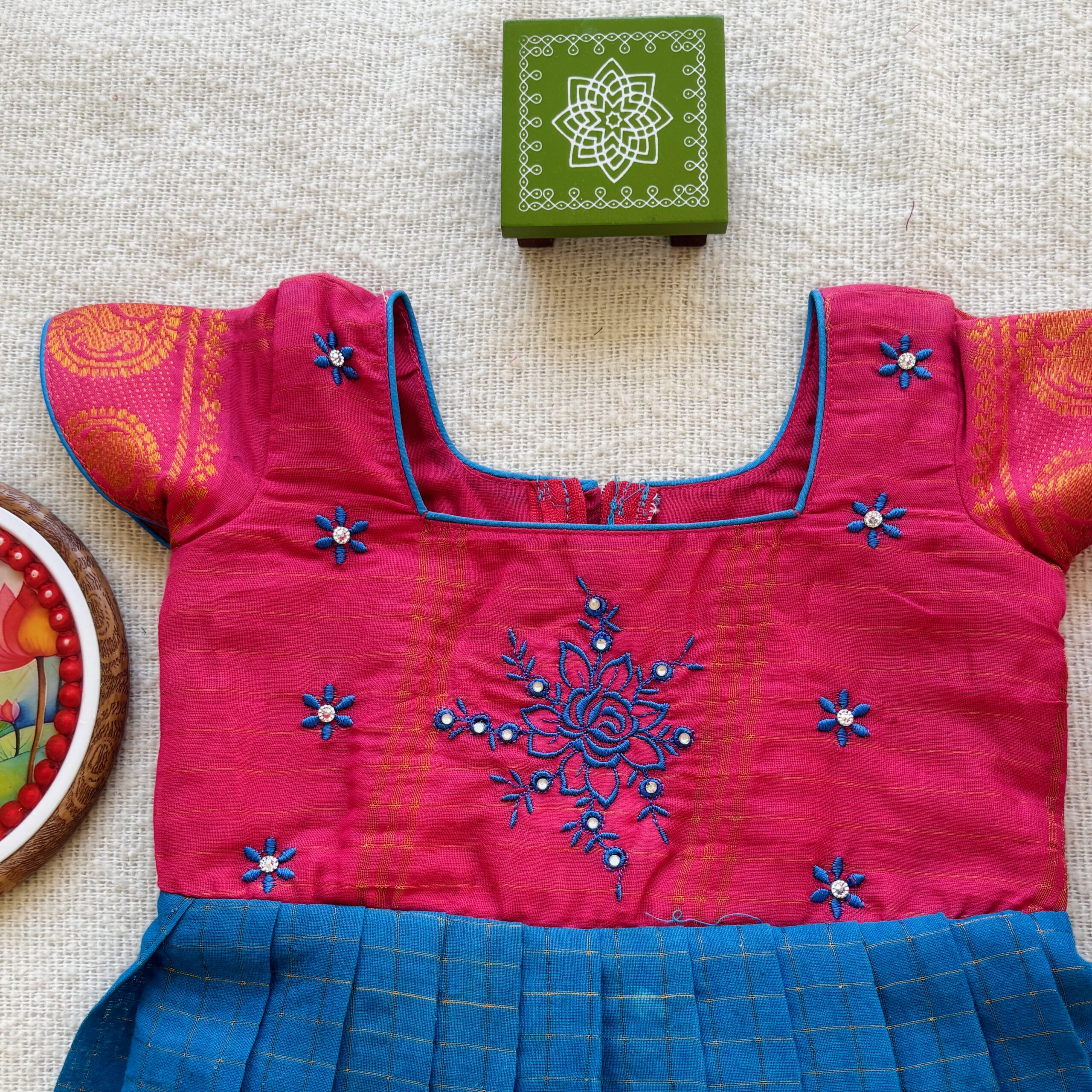 Embroidered pink bodice of kids frock