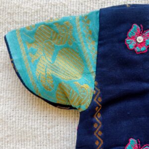 Teal sleeve detail of kids festive frock