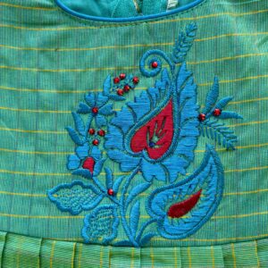 Close up embroidery work on kids frock