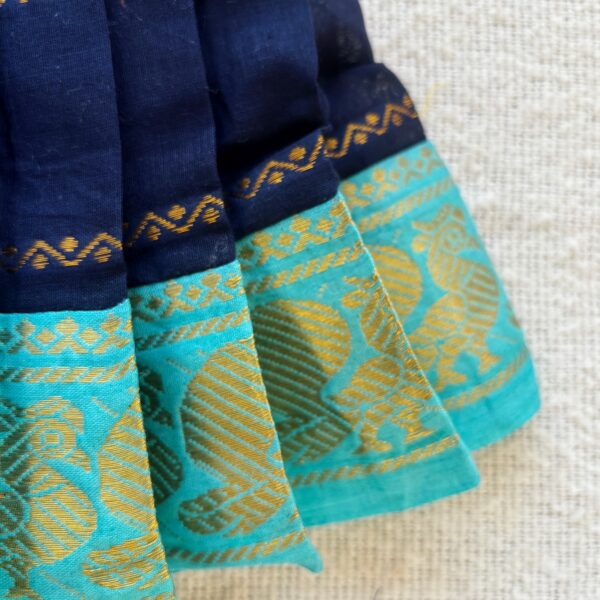 Teal traditional zari border detail of navy blue kids frock