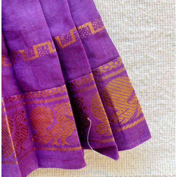 Traditional zari border detail of purple kids frock