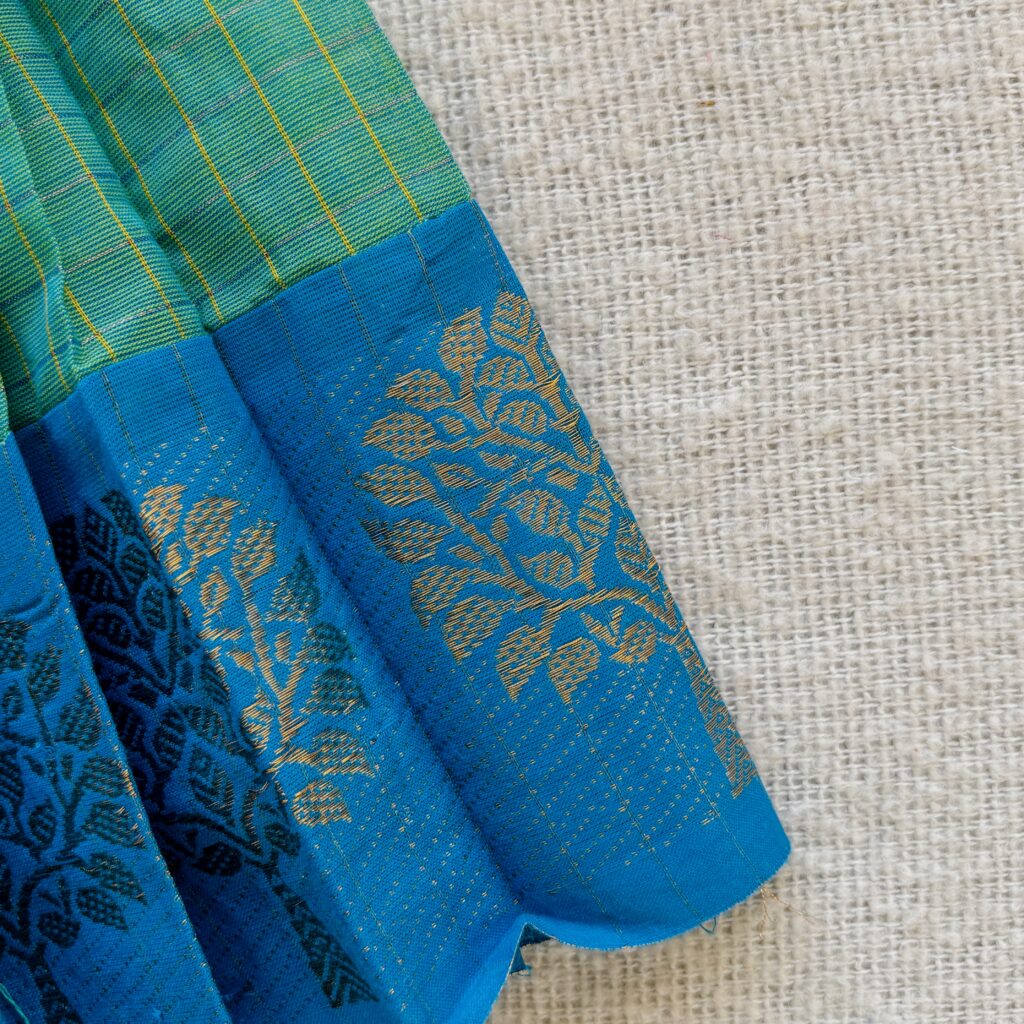 Blue zari border detail of kids festive frock