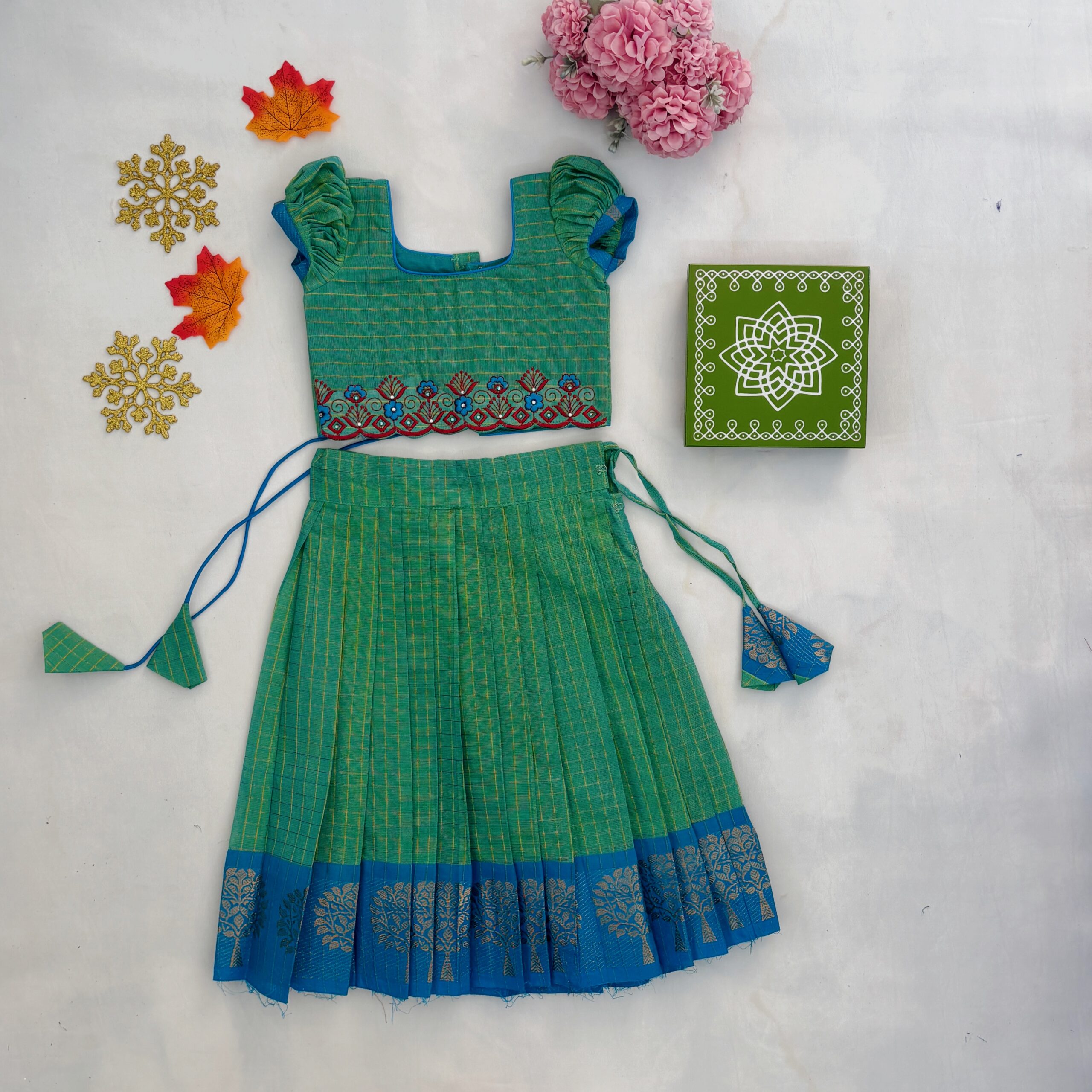 Green embroidered kids skirt and crop top set full view with blue border