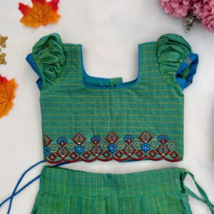 Top view embroidered neckline of green kids crop top