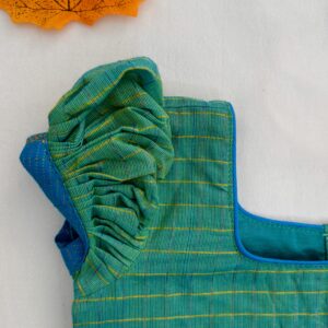 Sleeve detail of green embroidered kids crop top