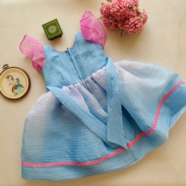 Pastel blue festive girls frock suitable for celebrations and parties