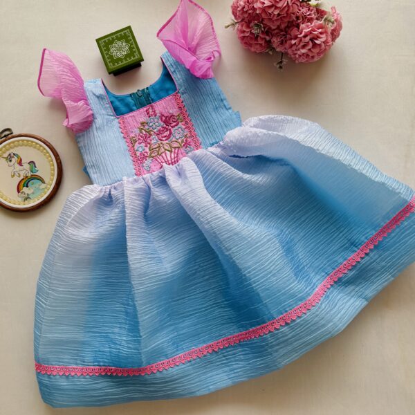 Pastel blue girls frock with floral embroidery in crushed organza fabric