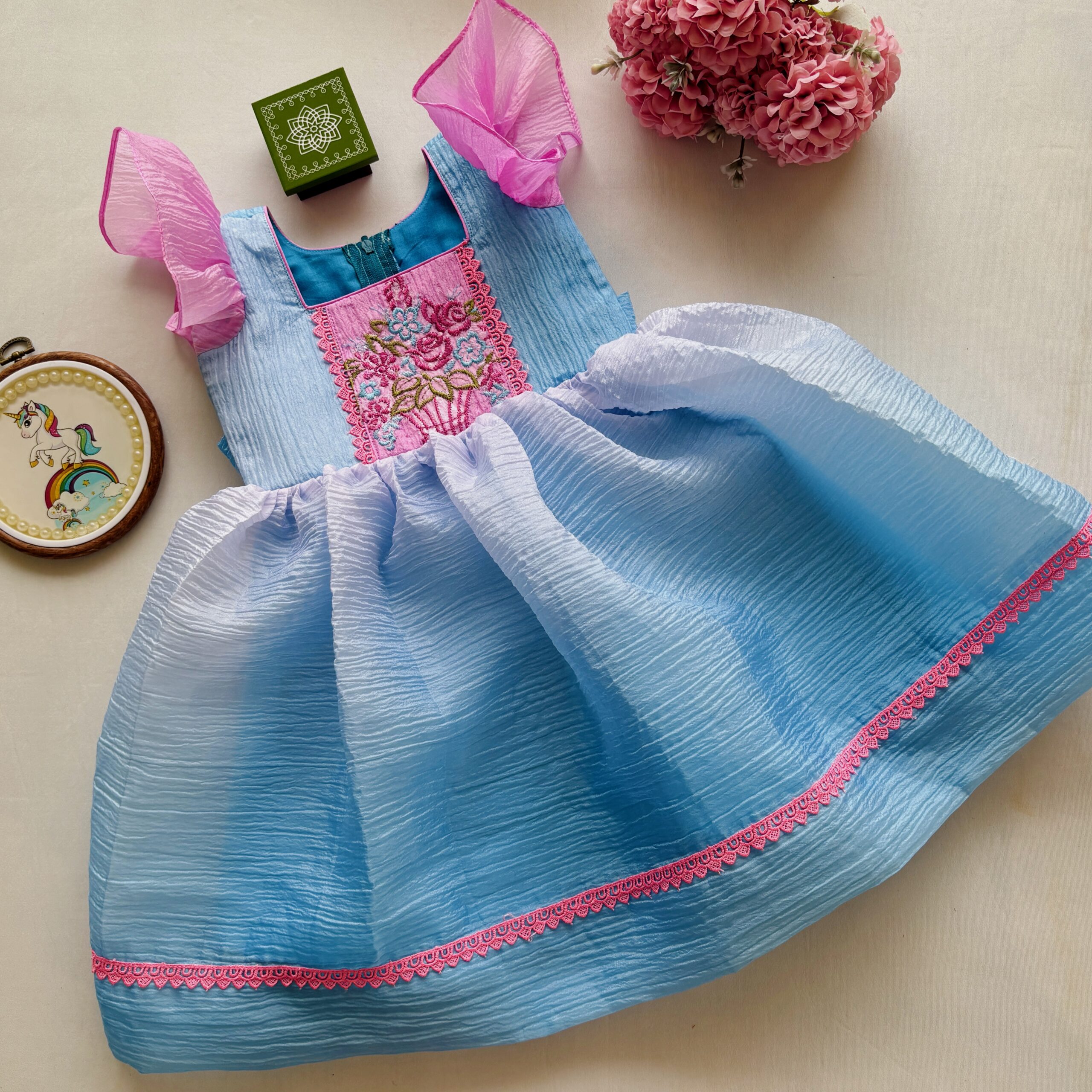 Pastel blue girls frock with floral embroidery in crushed organza fabric