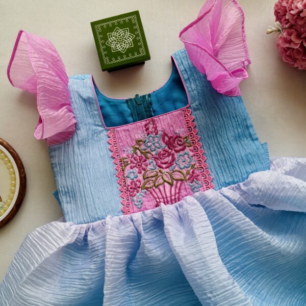 Elegant pastel blue organza girls dress with pleated cap sleeves