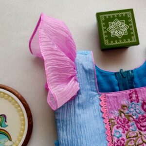 Designer pastel blue kids dress with gathered skirt and lace detailing