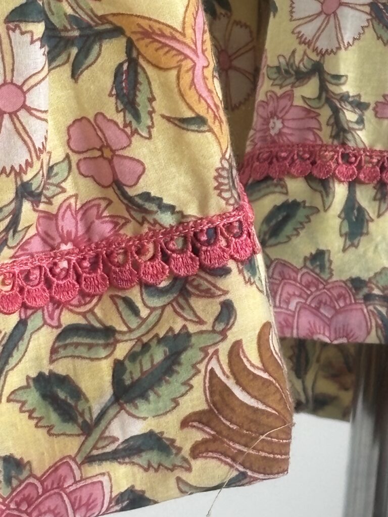 Yellow floral cotton frock with lace detailing for girls