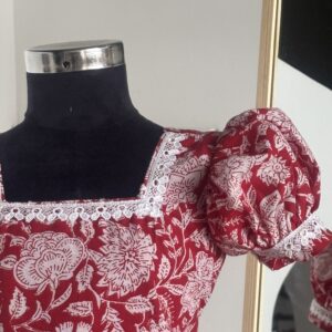 Side view of red floral cotton frock for girls