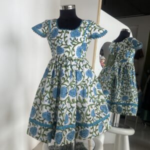 Blue cotton girls frock with floral hand block print and flutter sleeves by Varna Design Wear
