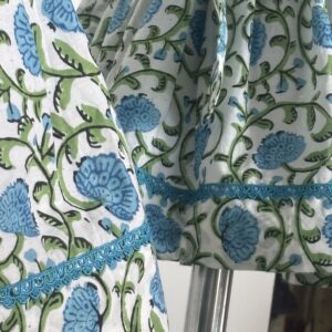 Blue cotton girls dress with floral print and lace border detail