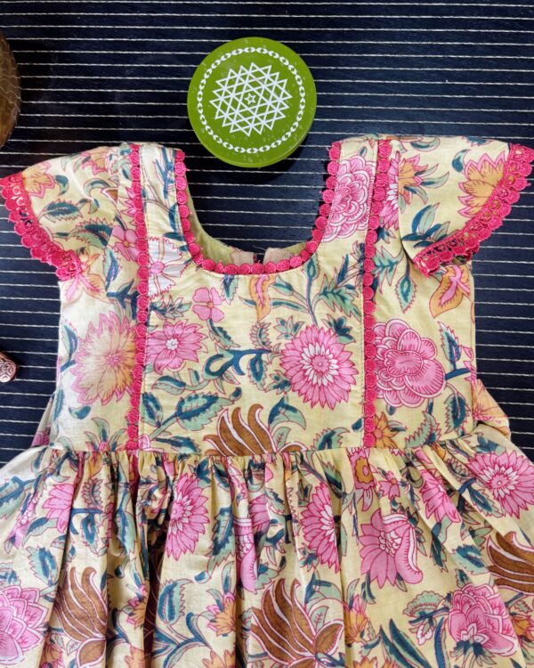 Floral cotton frock for girls with pink lace detailing
