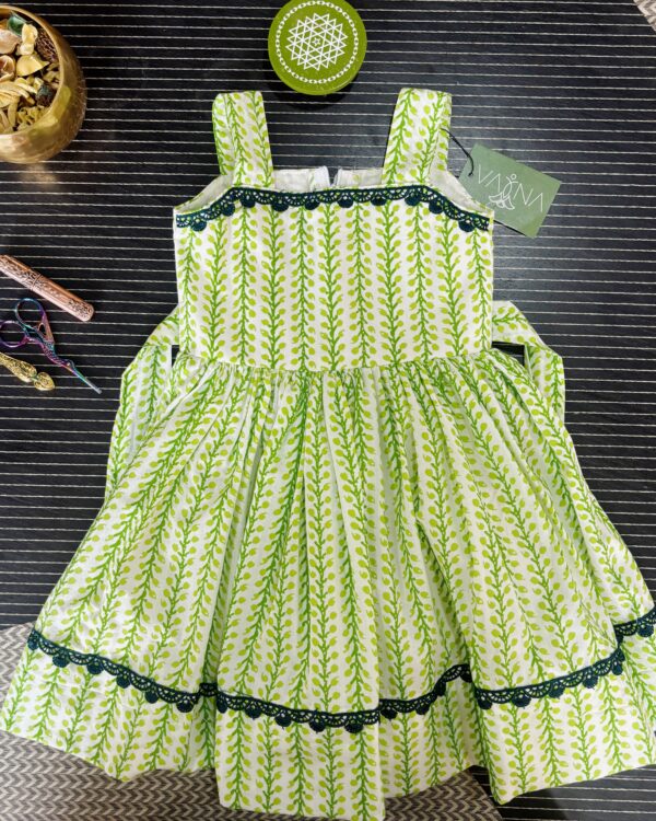 Designer green vine print frock for baby girls