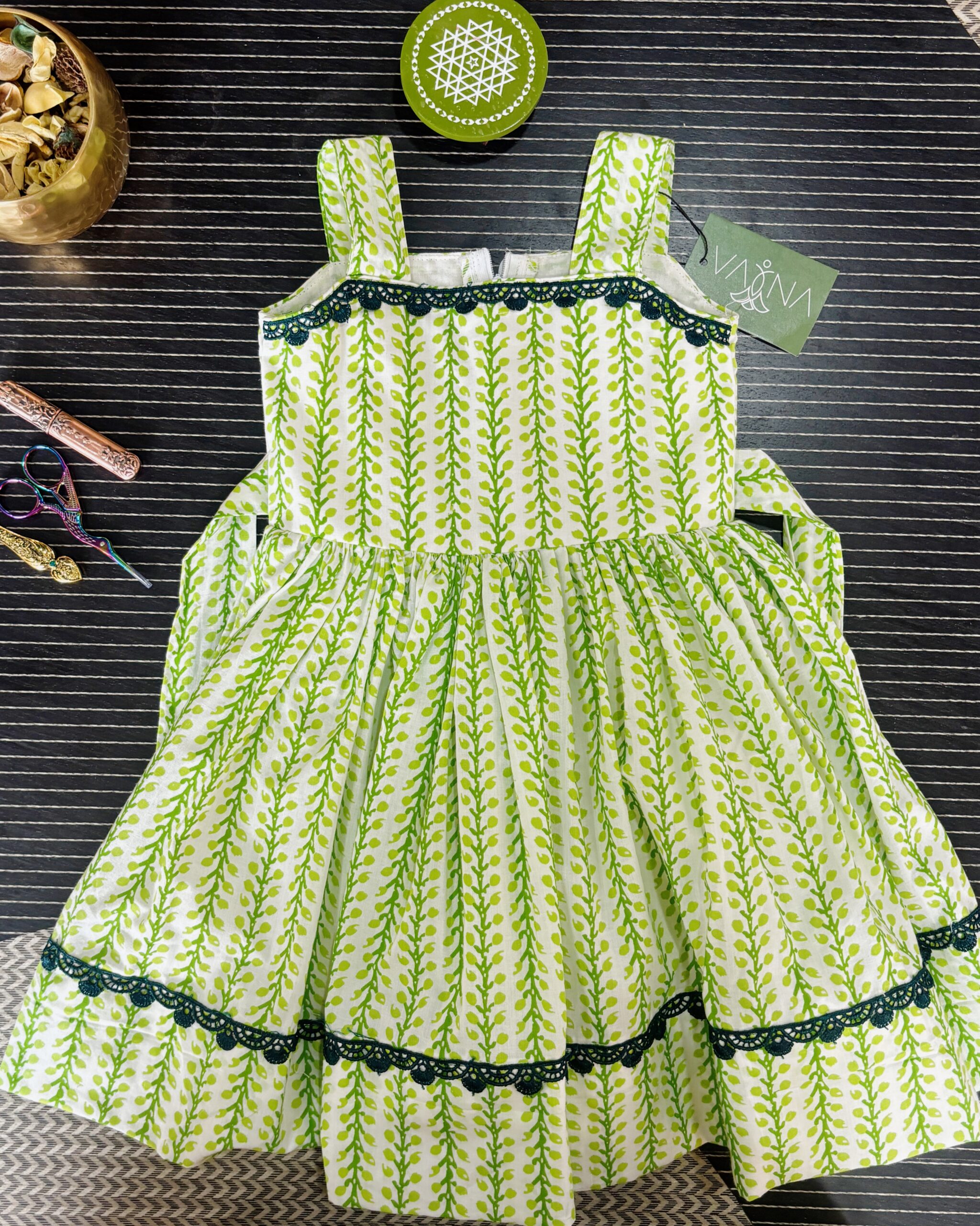 Designer green vine print frock for baby girls