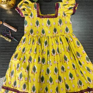 yellow cotton girls frock with puff sleeves front view