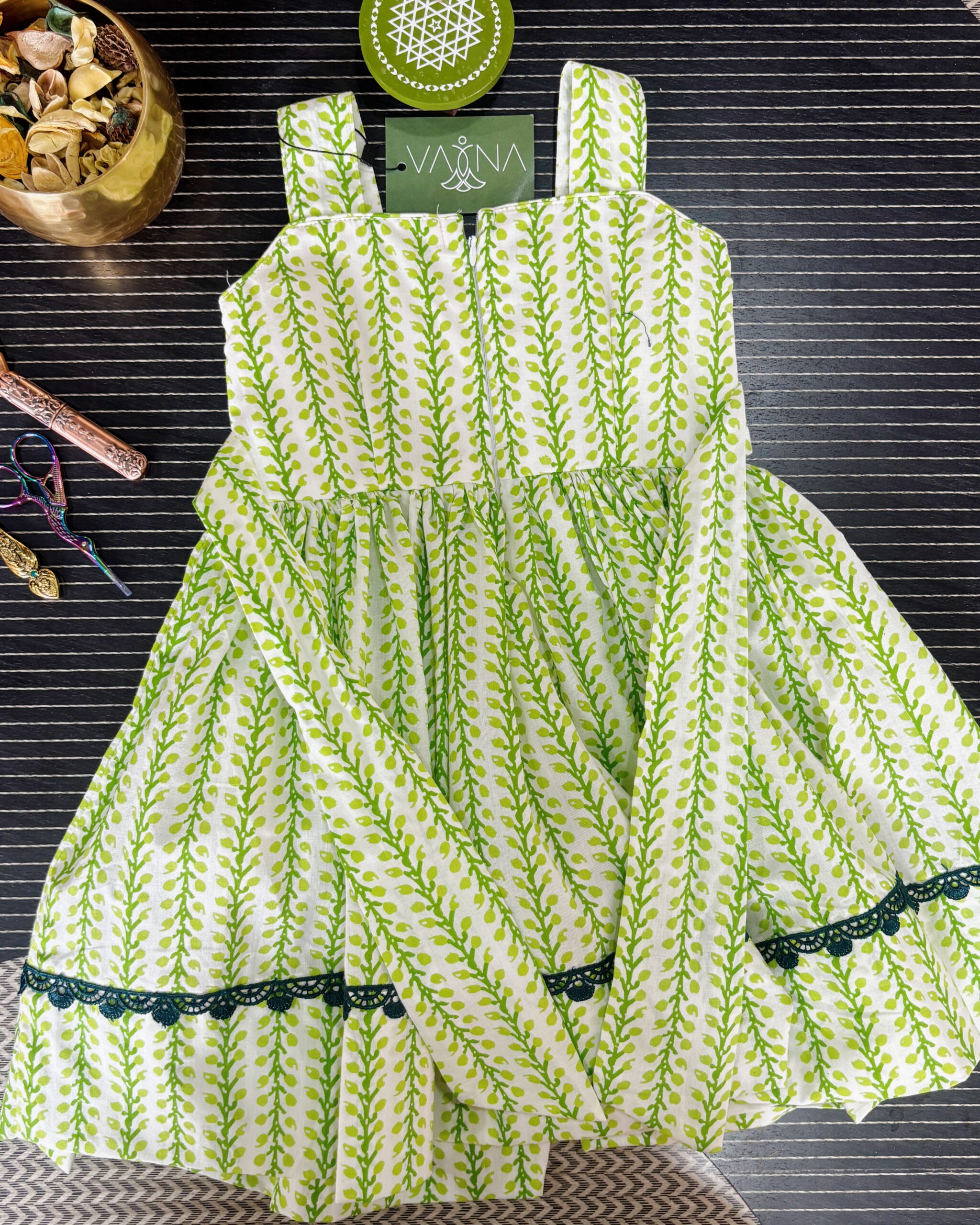 Green vine print cotton frock for girls with layered skirt