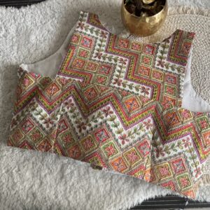 White designer print sleeveless blouse back