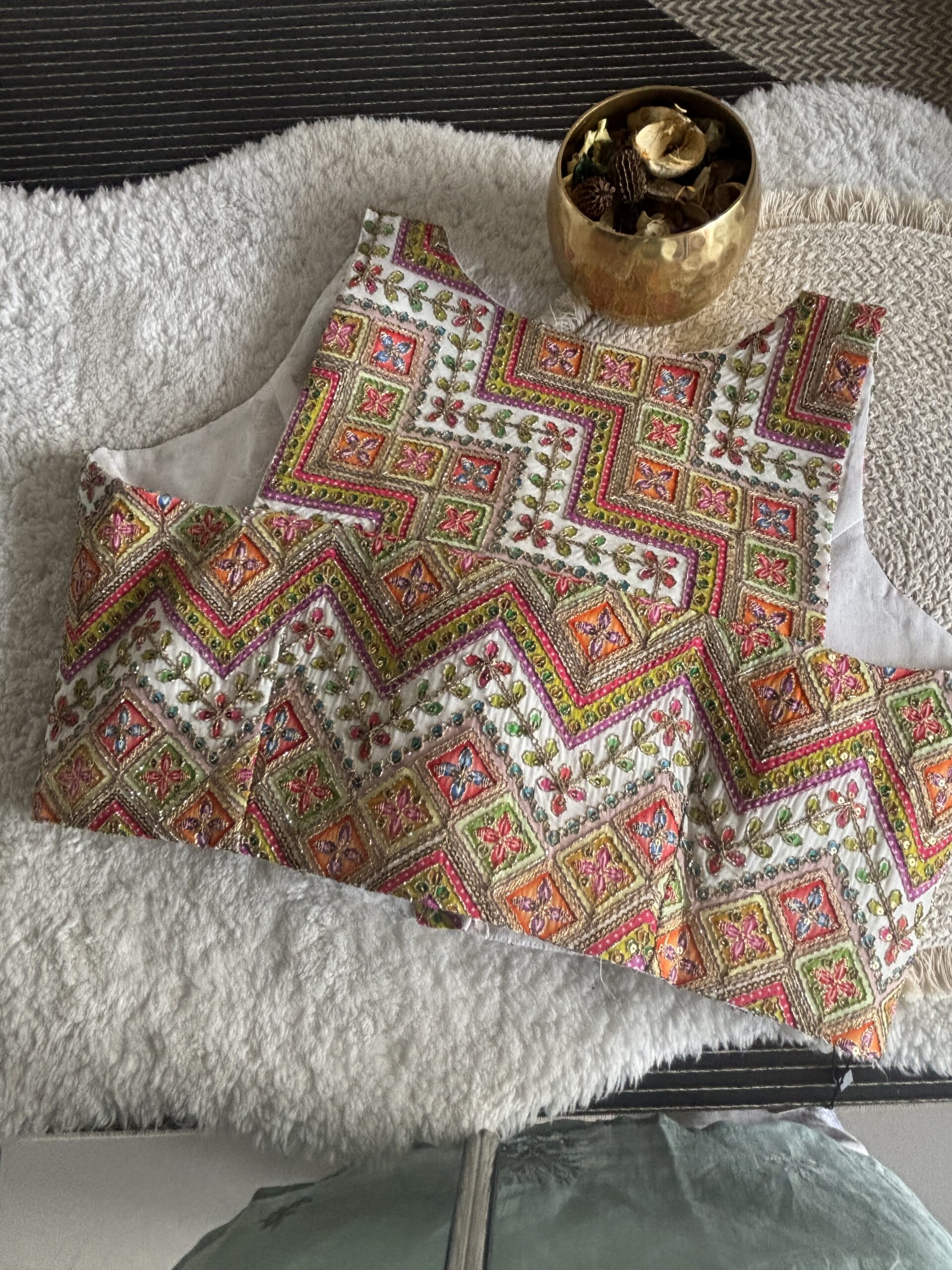 White designer print sleeveless blouse back