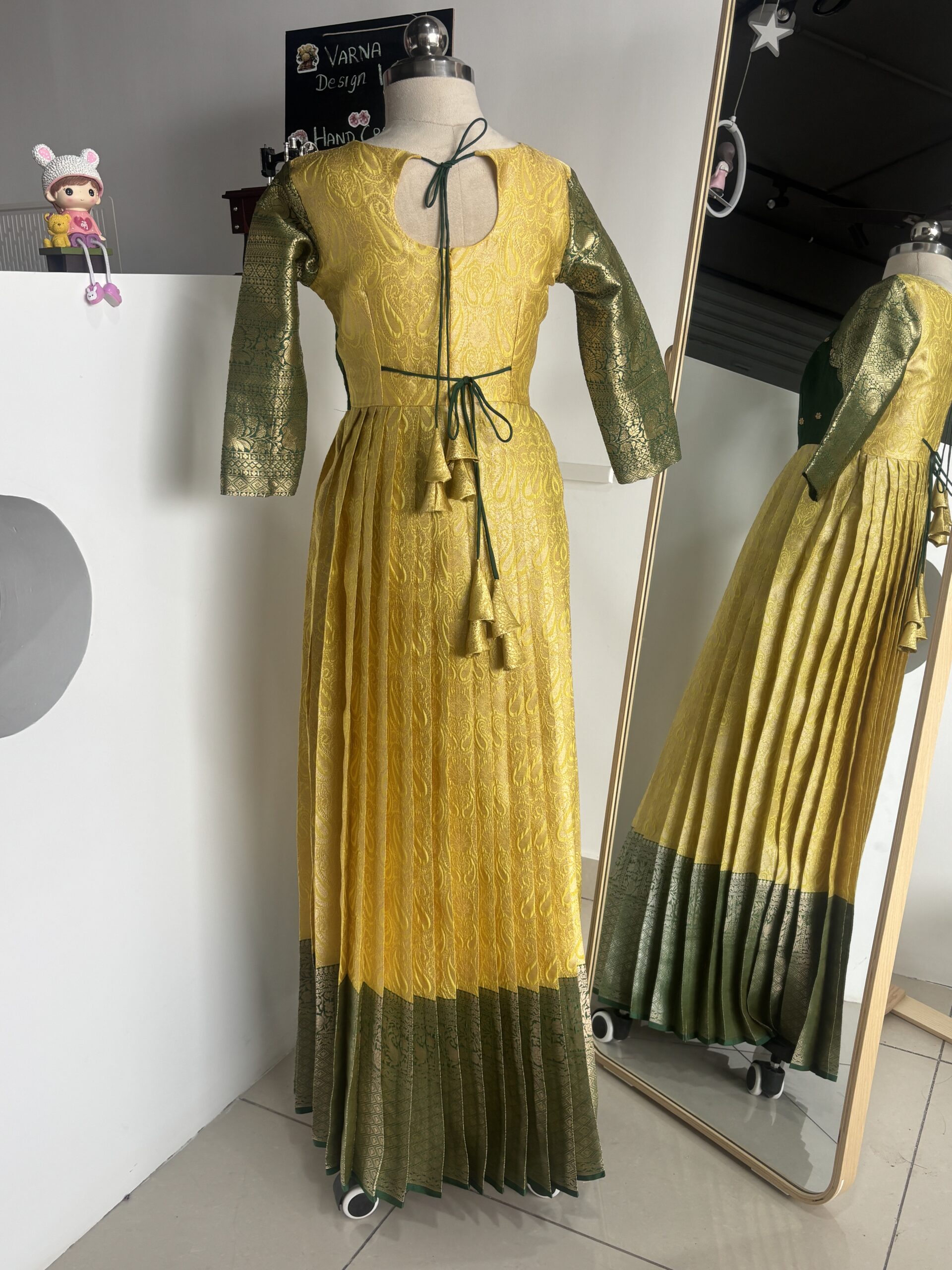 Designer Lemon Yellow Brocade Long Gown with Aari Work