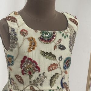 Embroidered peplum top for girls