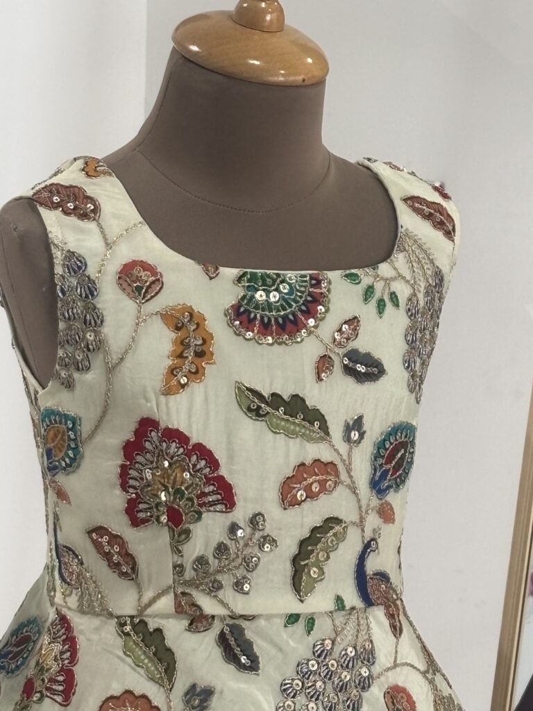 Embroidered peplum top for girls