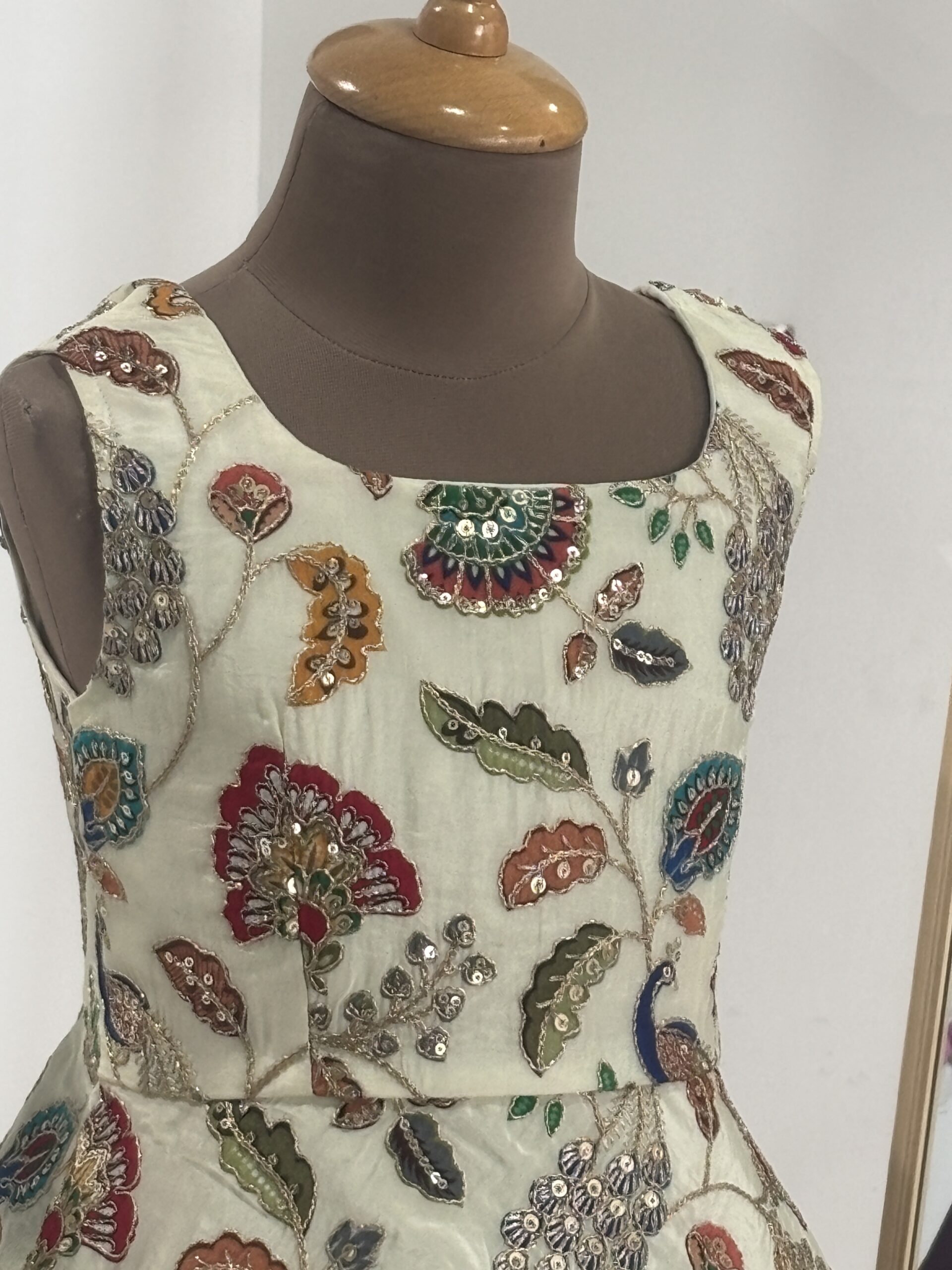 Embroidered peplum top for girls