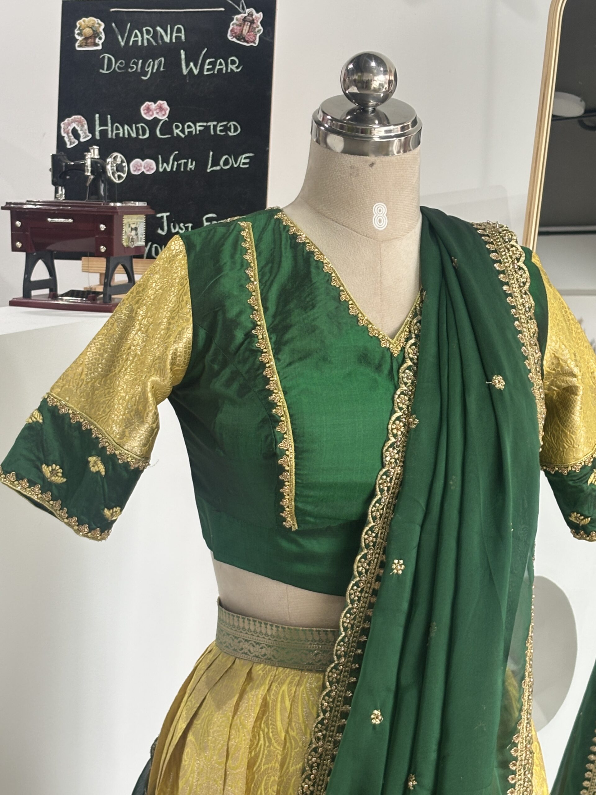 Bottle green pure silk embroidered blouse with designer sleeves