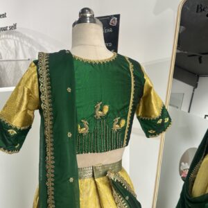 Bottle green hand embroidered blouse with peacock embroidery back design