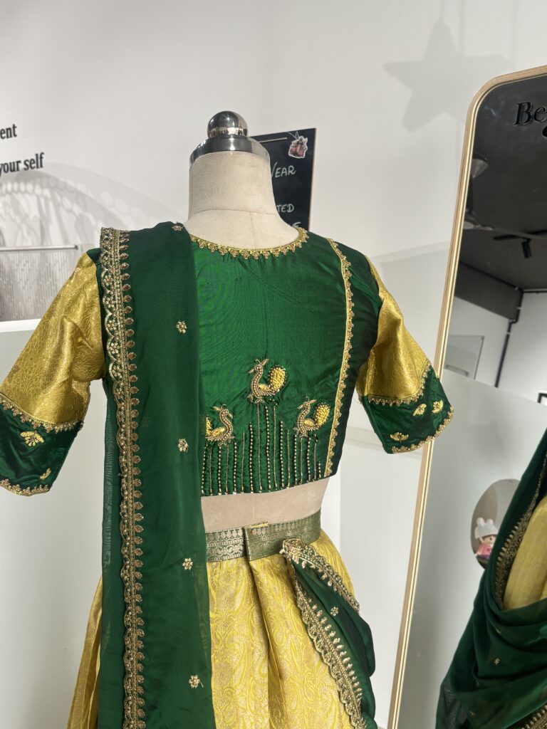 Bottle green hand embroidered blouse with peacock embroidery back design