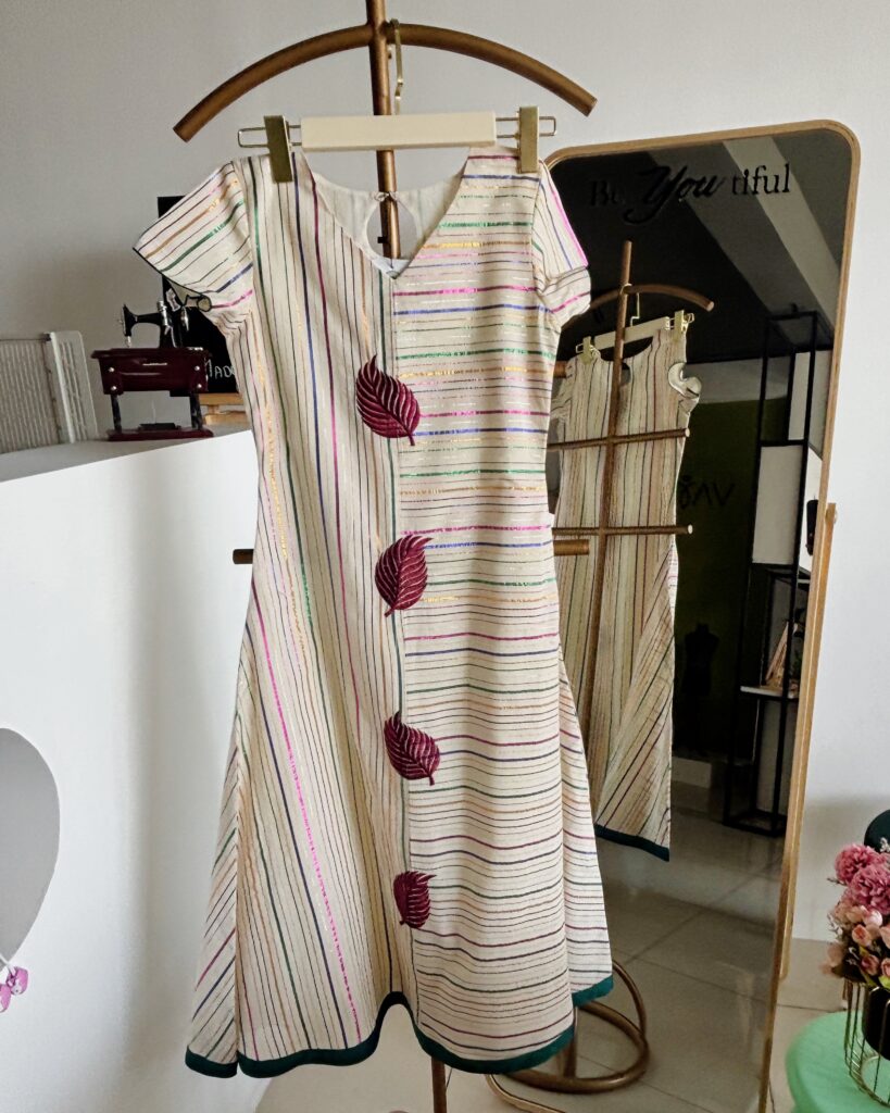 Nila Onam striped A-line top