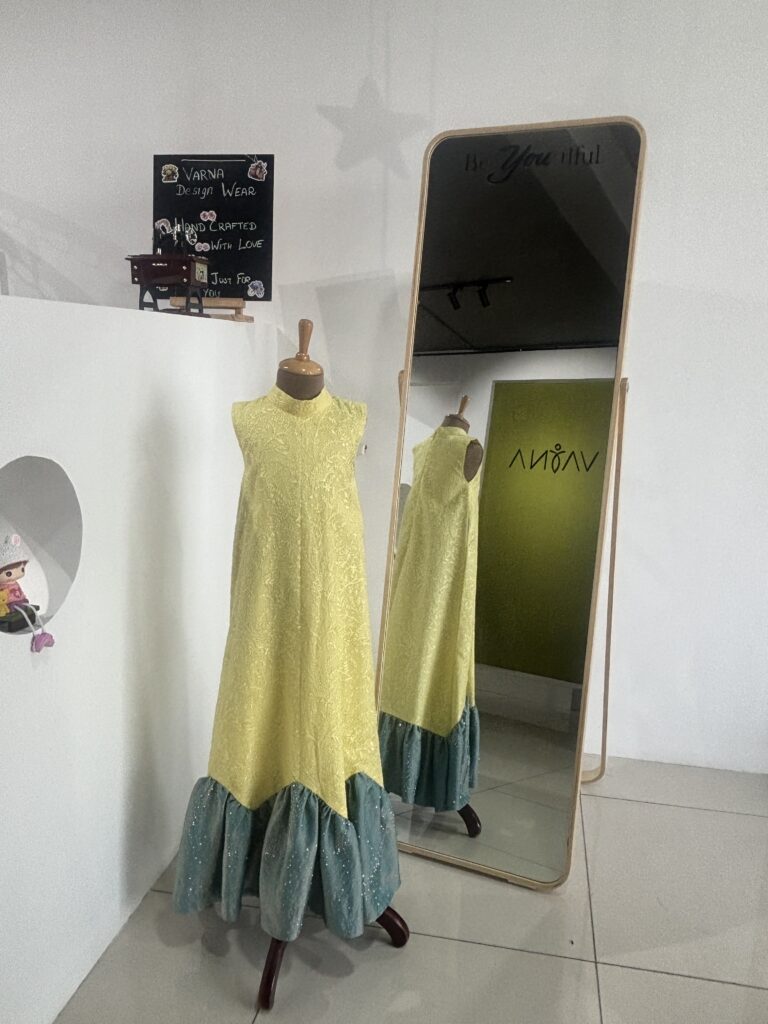 Yellow embroidered party wear gown for girls
