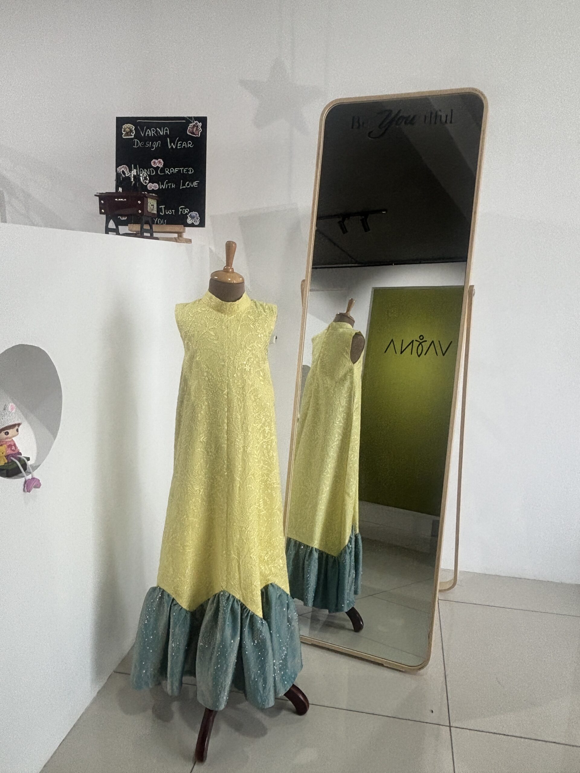 Yellow embroidered party wear gown for girls