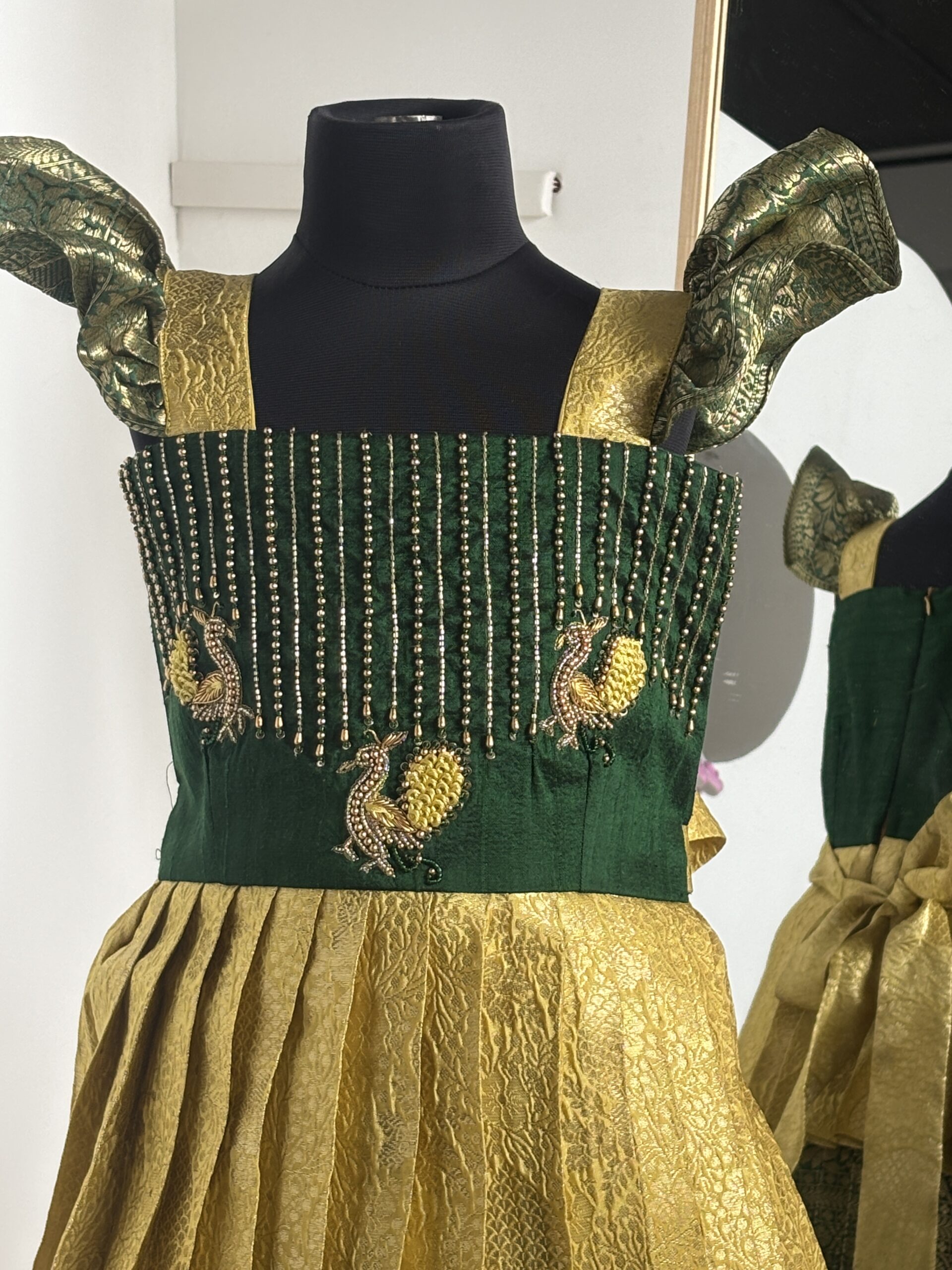 Peacock embroidery on kids festive frock